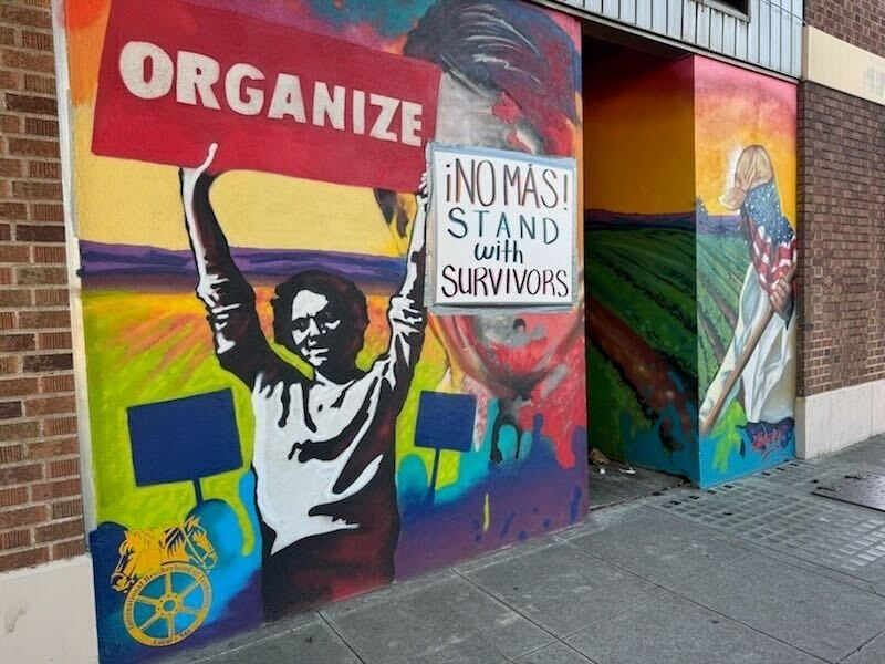 A sign has been placed over the downtown Modesto mural on the Peace/Life Center featuring late labor leader Cesar Chavez. The nonprofit board put the sign up after an investigation by The New York Times uncovered allegations of sexual abuse of minors and young women. Credit: Jim Costello / Modesto Peace/Life Center