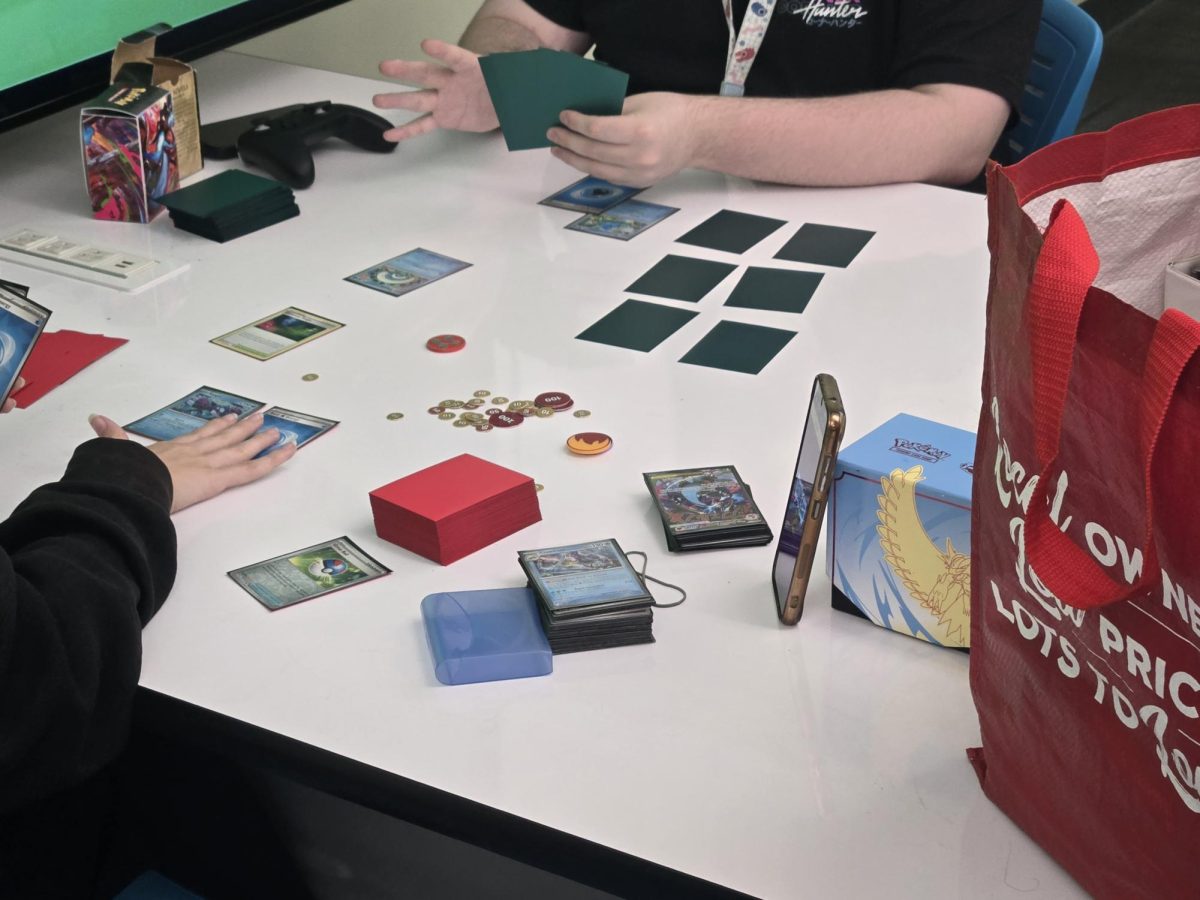 Picture of a couple people playing the Pokemon Trading Card Game from First Gaming Club meeting at Stan State on Friday, Feb. 6th, 2026, in Turlock.
