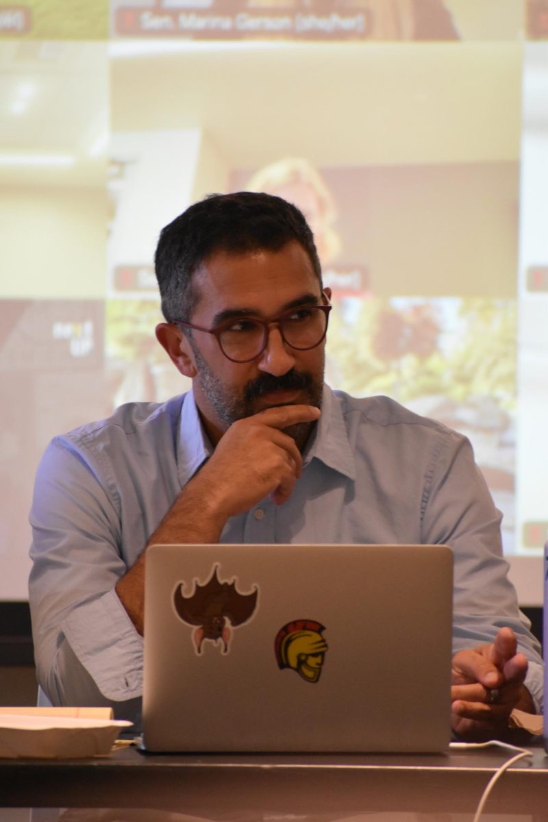 Speaker Arya Alami looking over at Senator Koni Stone at the academic senate meeting on Tuesday, May 12, 2026, in Turlock.
